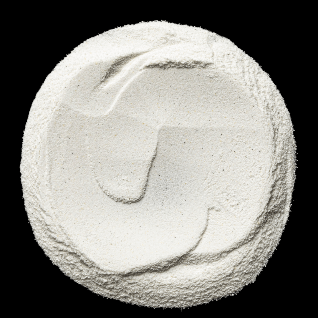 Feine Pudertextur des Skin Regimen LX Enzyme Exfoliator – aktiviert mit Wasser zu einer cremigen Peeling-Formel für sichtbar glattere Haut.